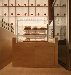 Modern retail space with concrete finishes and industrial design elements.