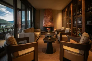 Modern living room with wooden furniture and a fireplace.