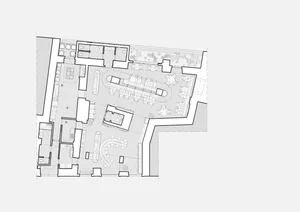 A detailed 2D architectural blueprint of a modern interior space, depicting various functional zones and spatial compositions