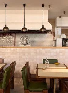 Modern cafe bar interior with ceramic tile wall