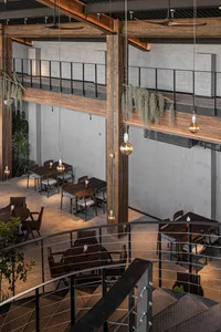Industrially designed restaurant interior featuring wooden materials