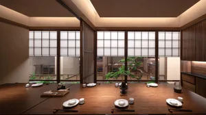 A modern, residential interior featuring wooden furniture and a serene Japanese-style setting.