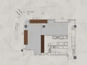 Detailed 2D architectural drawing of a restaurant layout featuring wooden accents, concrete flooring, and glass walls.