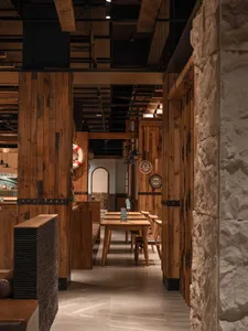 Industrial-themed retail storefront with wooden paneling and rustic decor.