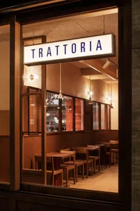 Restaurant interior with wooden furniture and warm lighting