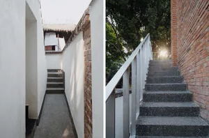 Concrete stairs and metal railing in a minimalist architectural design.