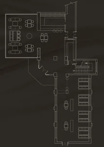 Industrial restaurant design with steel beams and open seating areas.