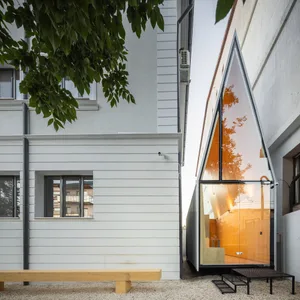 Modern house extension featuring a glass extension.