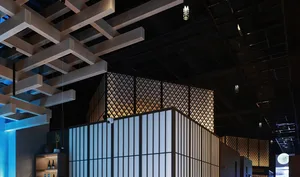Modern restaurant interior featuring metallic grid walls