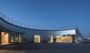 Modern building with all-glass facade at night