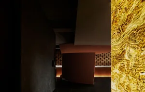 Modern interior design of a hotel suite featuring luxurious marble accents and contemporary style.