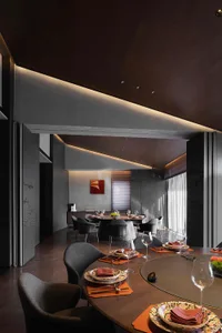 Contemporary dining room with contemporary furniture, wood flooring, and minimalist decor