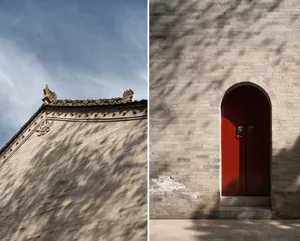 A traditional Asian building constructed with brick material, featuring intricate architectural design.