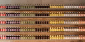 Various bottles of alcohol displayed in a store or bar