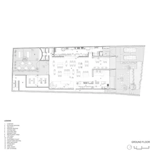 A detailed architectural floor plan of a restaurant showing indoor and outdoor seating areas, kitchen, and various functional