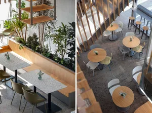 A modern industrial-style cafe interior featuring wood, concrete, and metal materials.