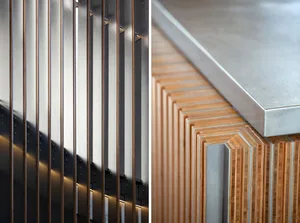 Close-up of a modern architectural feature showcasing the use of wood and steel materials.
