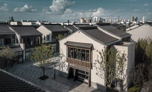 A street view image featuring buildings made of concrete, glass, and tile.