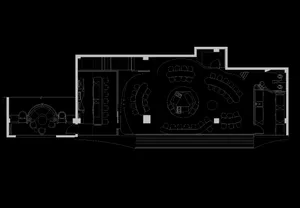 An overhead view of a modern restaurant floor plan featuring a central dining area surrounded by circular booths, and additio