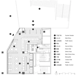 A detailed 2D architectural drawing of a restaurant floor plan showing various functional zones and entrances.