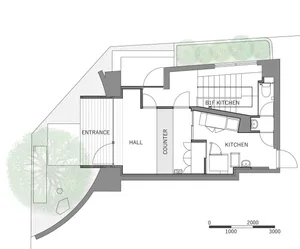 Modern house plan featuring contemporary architecture with wooden accents, glass walls, and metal railings.