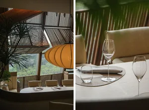 現代餐廳室內空間，搭配木質元素，並可眺望戶外綠意。