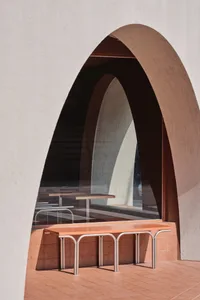 Modern, metal-and-ceramic table in a coffee shop interior