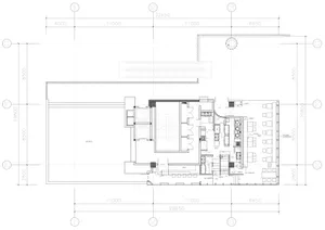 Floor plan of a restaurant showing layout and dimensions with various functional zones and furniture placement.