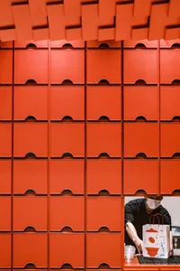 Red storage units in a retail space