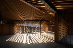 A modern interior designed with wood and brick materials.