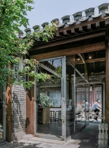 Glass and wooden exterior of a modern coffee shop