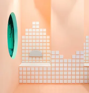 A minimalist retail store with white tiled walls and floor, featuring a green circle window.