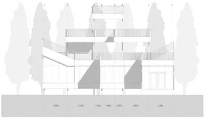 Modern architectural design featuring concrete materials and open spaces.