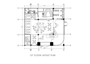 Blueprint layout of an office space showing individual desks and a central meeting area.