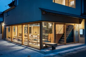 Modern storefront with wooden interior and exterior design.