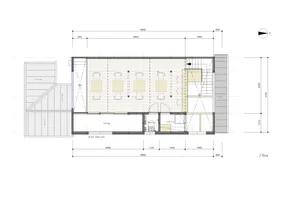 A detailed 2D architectural drawing of a modern office space featuring a high ceiling, open floor plan, and spacious layout.