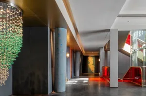 Modern hotel lobby featuring metallic design elements