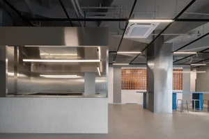 Modern kitchen with concrete and glass materials