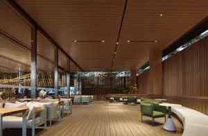 Modern restaurant interior with wooden accents, fabric seating, and mixed materials