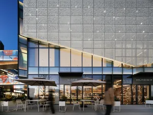 Modern retail space with glass storefront and metal cladding