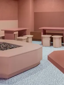 Modern restaurant interior designed with terrazzo surfaces.