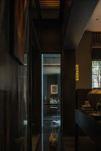Modern, luxurious corridor featuring concrete and glass materials