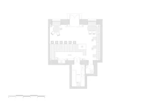 A restaurant floor plan featuring concrete and glass materials.