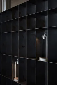 Minimalist interior with metallic shelving system