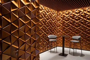 Modern cafe bar interior with wood texture fetch, featuring a high-top table with stools and a sleek design.
