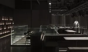 Modern bar room with glass, metal, and concrete materials