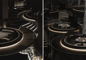 A modern restaurant/bar interior featuring metallic surfaces.