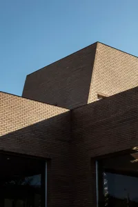 Modern building exterior made of brick.