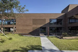 Modern office building with brick exterior and glass windows