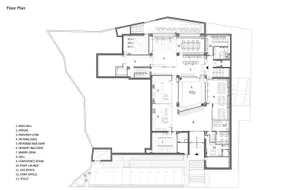 A detailed architectural floor plan of a modern office layout, showing various functional zones and spaces.